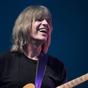 Mike Stern playing guitar on stage